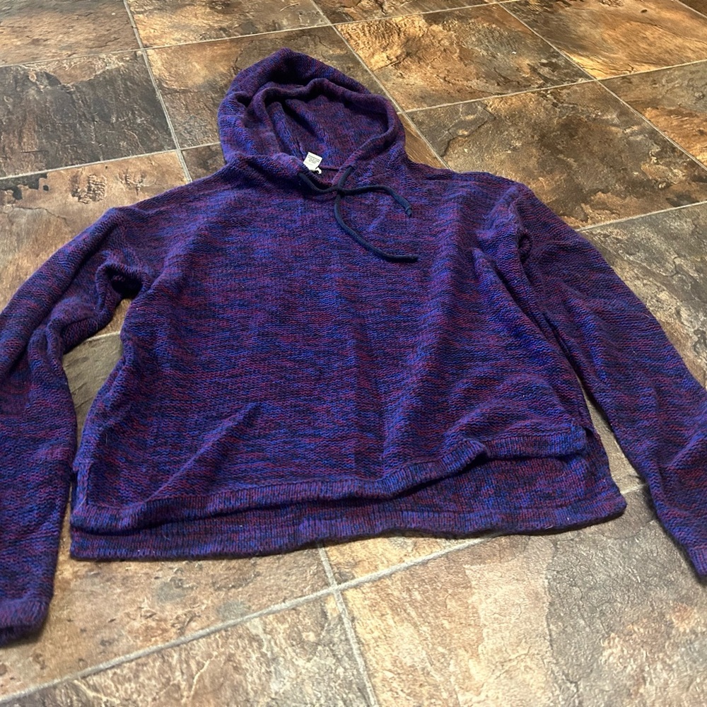 eight long sleeved sweater/shirts.